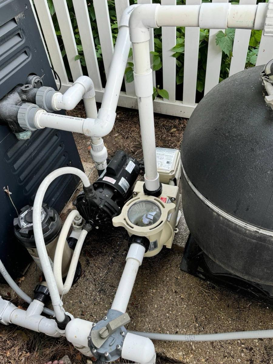Pool pump, filter and heater equipment pad serviced by Heartland Pool and Spa